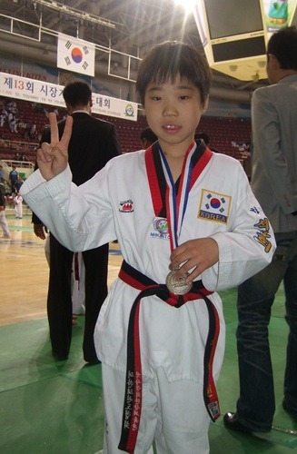 석현, 태권도 첫메달